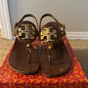 Classic Tory Burch Strappy Sandals.